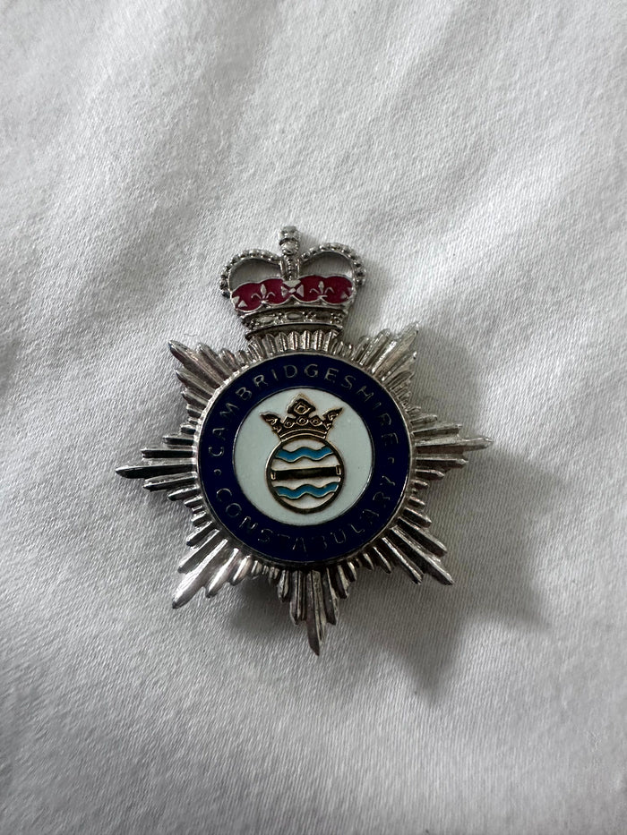 Cheshire Constabulary enamel star badge with Queen's crown and blue enamel centre