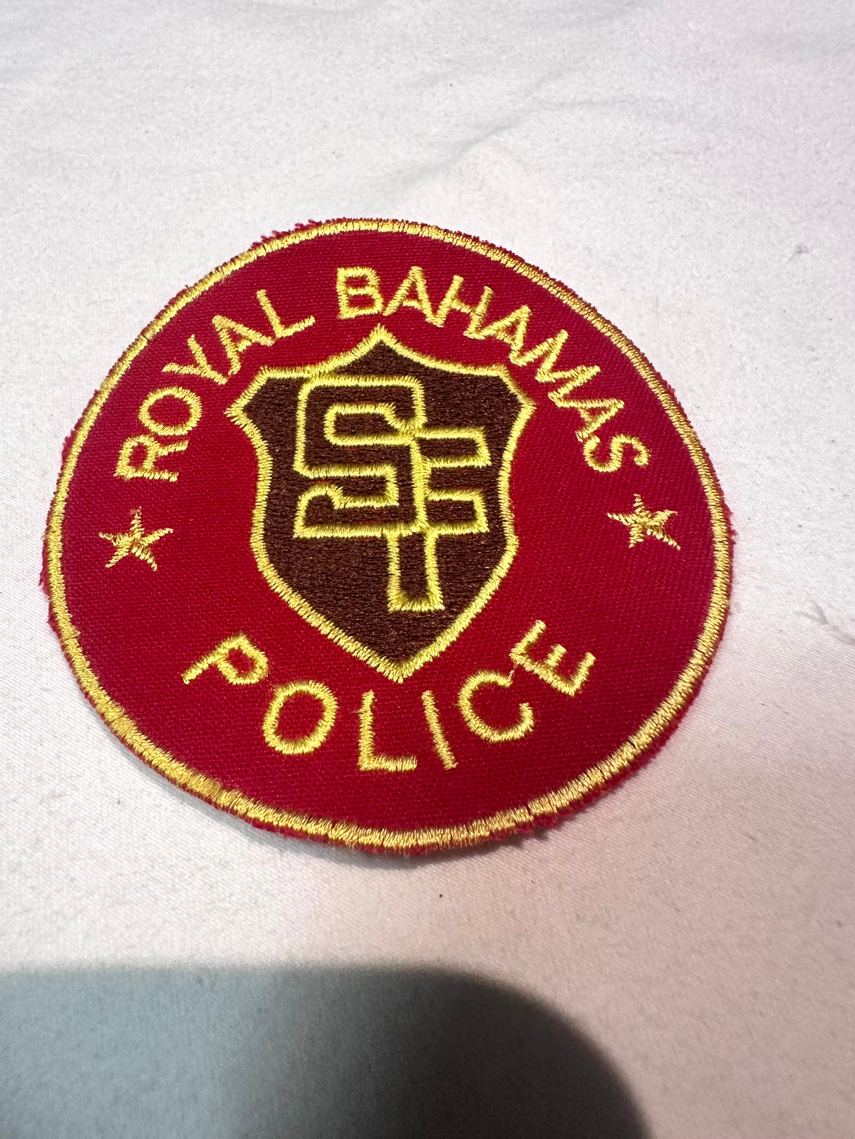 Royal Bahamas Police red and gold embroidered patch